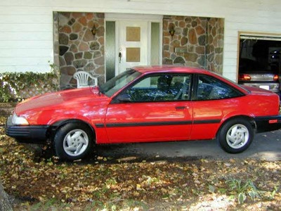 1993 Red Chevy Cavalier RS.