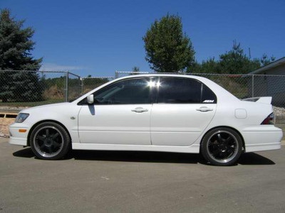 2002 mitsubishi lancer OZ ....9,700$