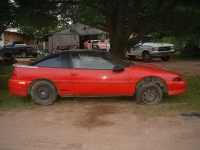 1994 eagle talon, and 2 dodge neons