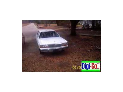 1989 Ford Crown vic w/blue int.