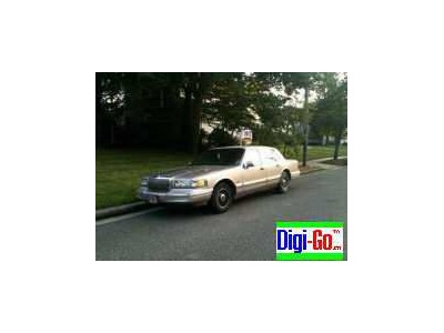 1995 Lincoln Towncar tan