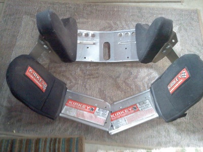 Kerkey seat containment system