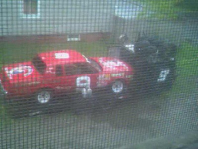 Racecar and car trailer