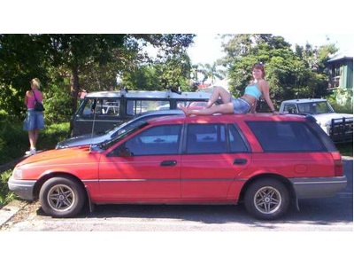 fast red car on expensive alloy wheels!