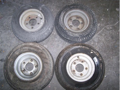 set of dolly rims and tires